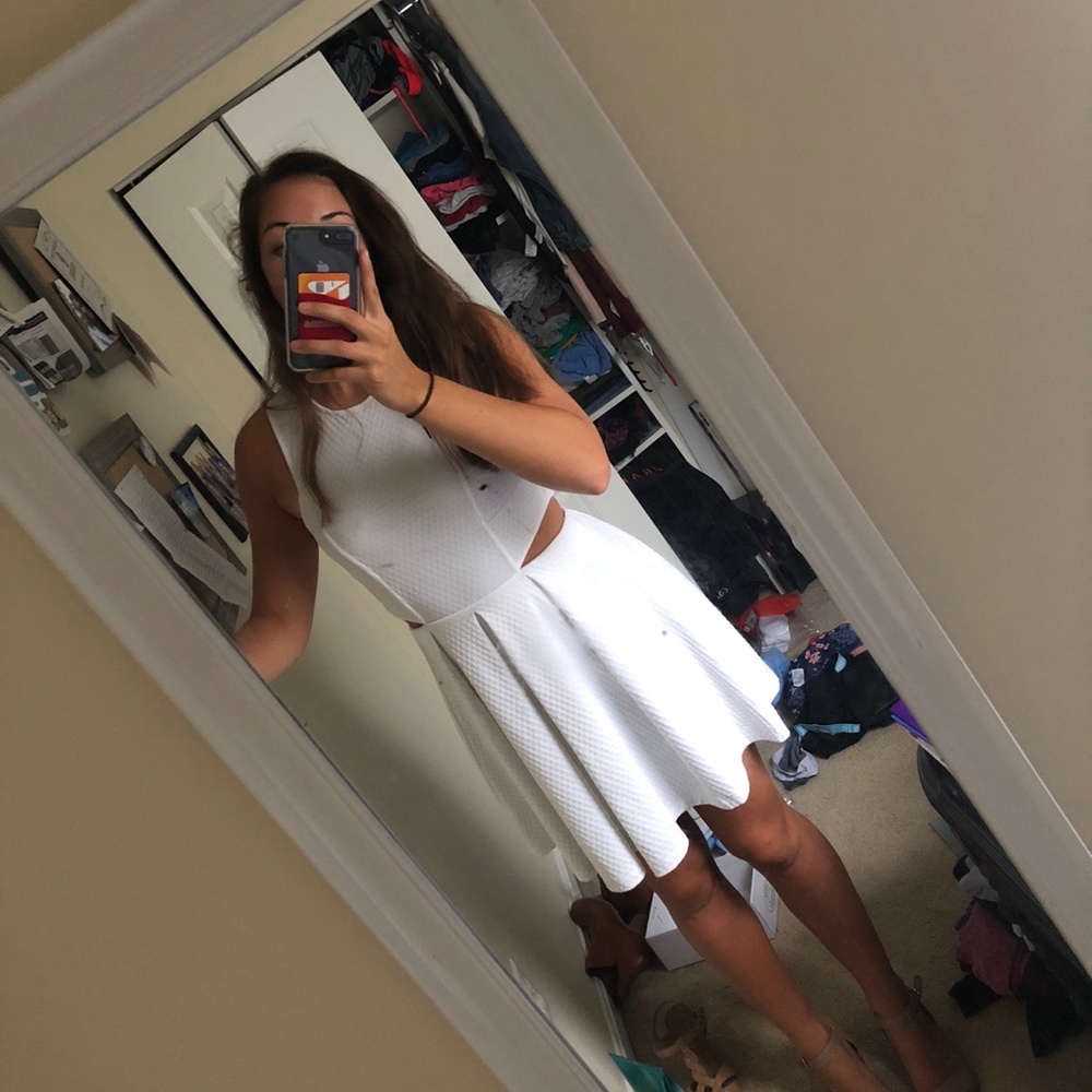 White dress with cutouts